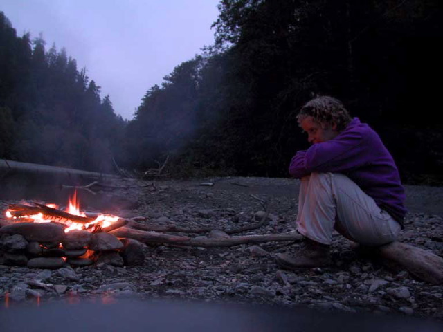 Jenn, mesmerized by the flames. 