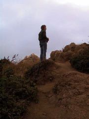 Jenn, staring out to sea.